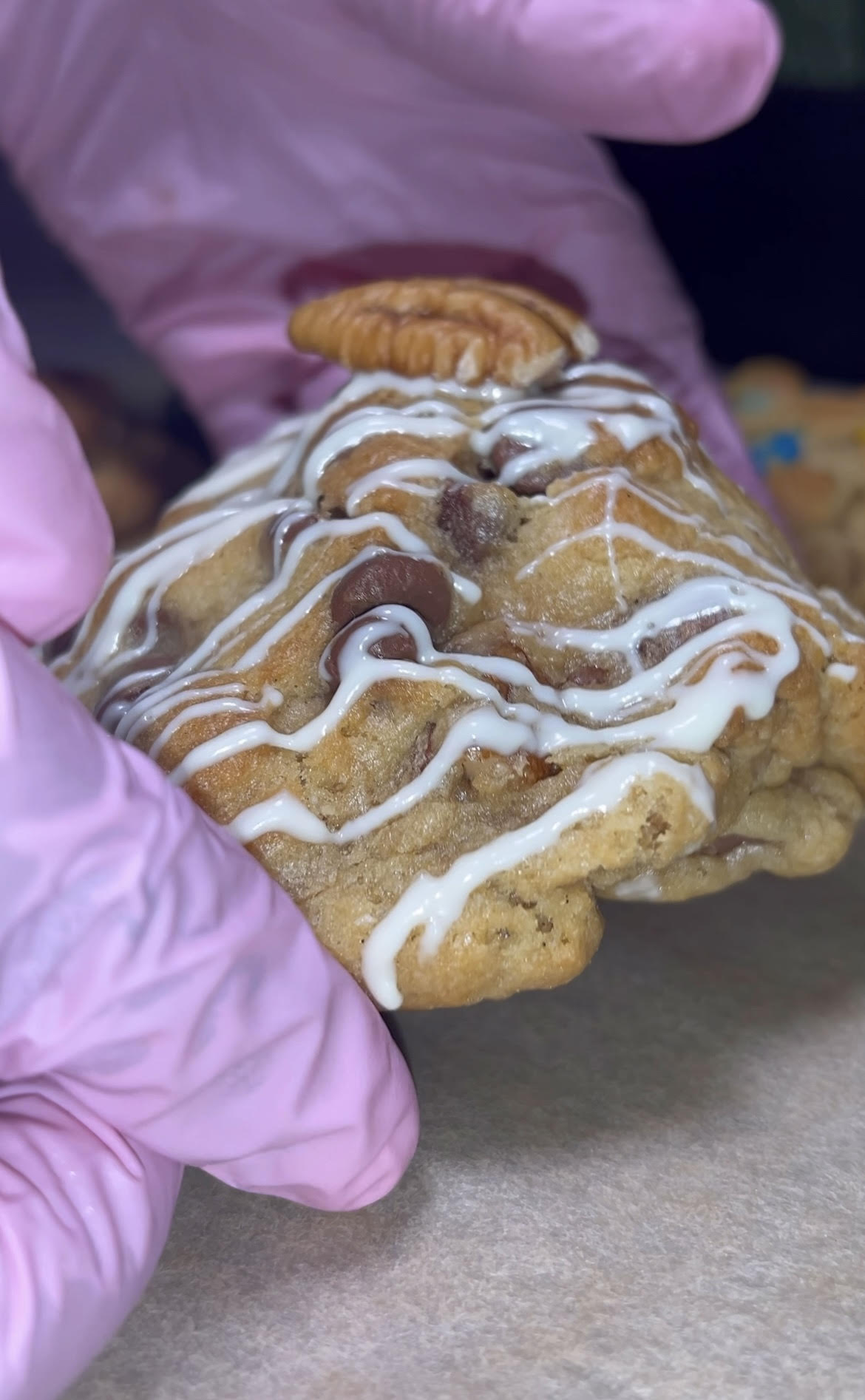 Best Chocolate Chip Pecan Cookies with Turtle Candy & White Chocolate Drizzle