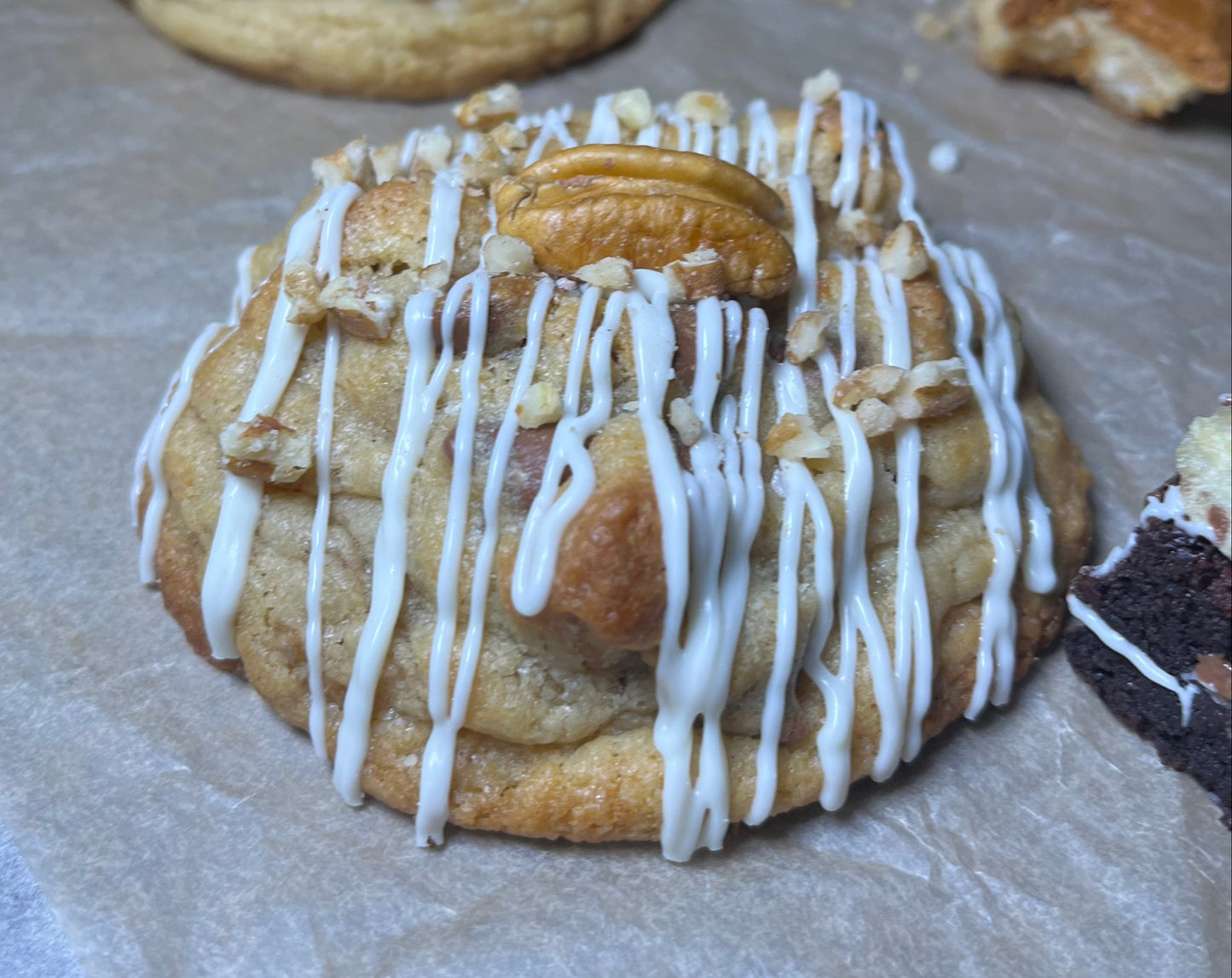 Best Chocolate Chip Pecan Cookies with Turtle Candy & White Chocolate Drizzle